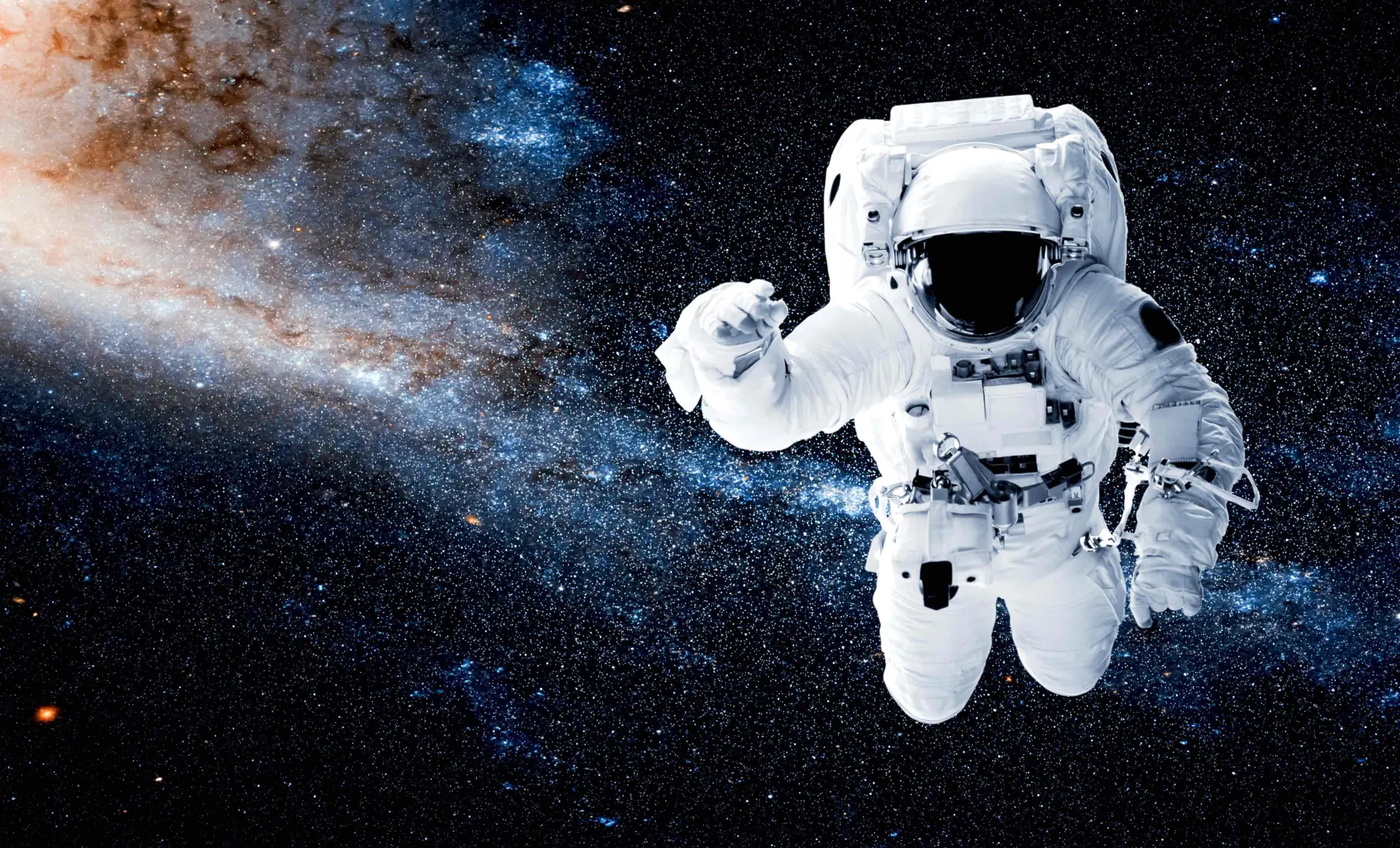 Astronaut floating above Earth